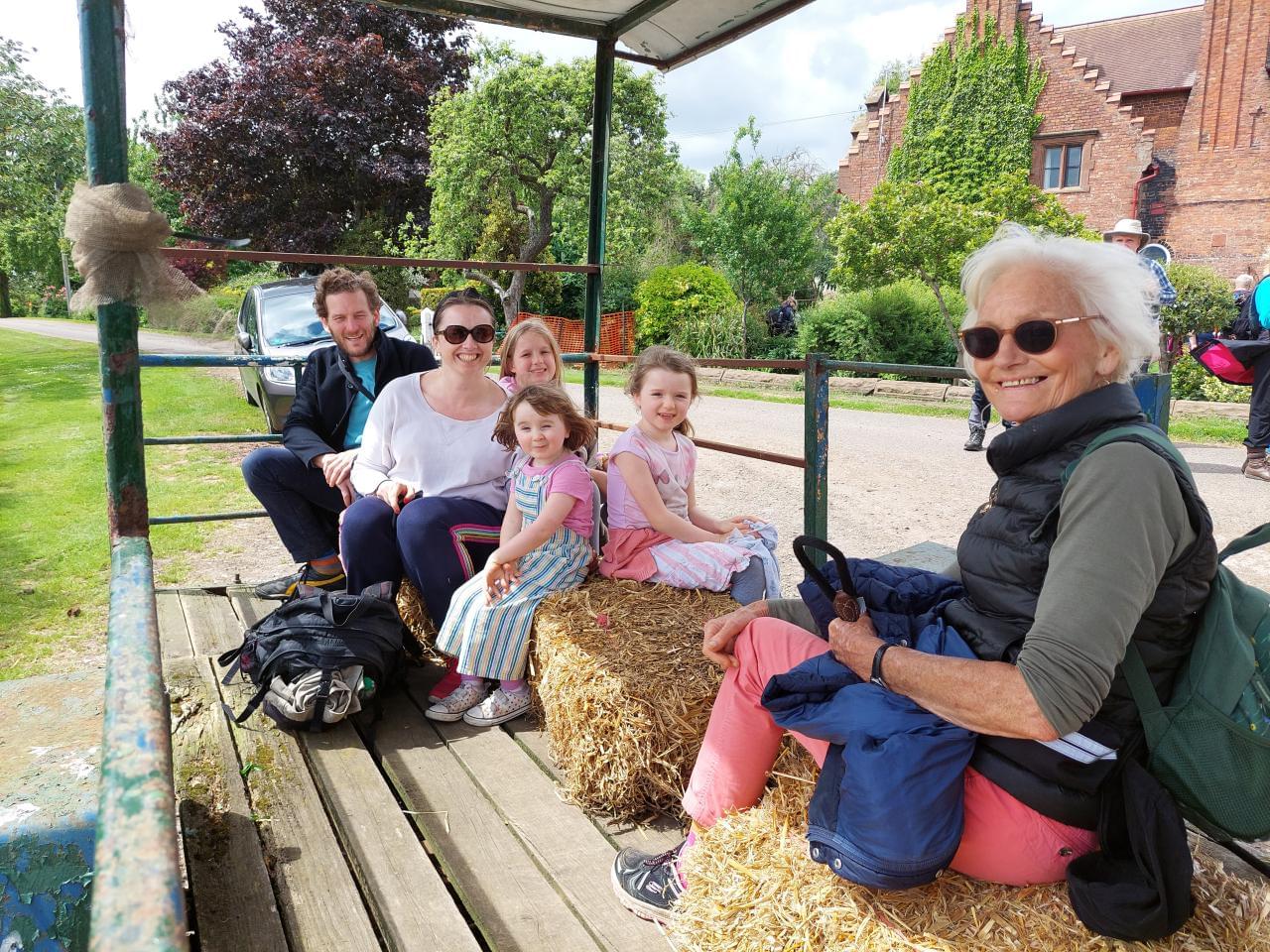 Family on a trailer at Cotton Abbotts
