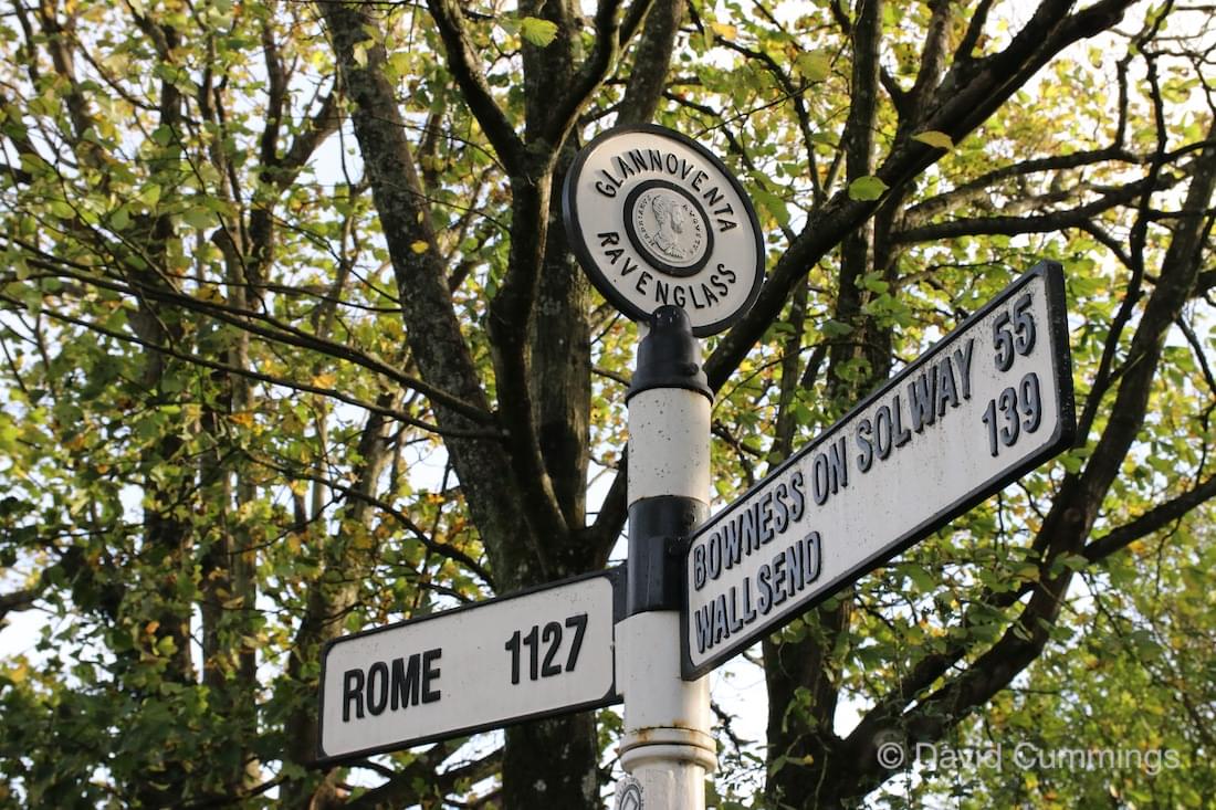 Signpost to Rome & Hadrians Wall at Ravensglass.