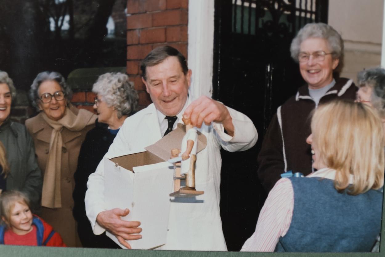 Jim receiving prsents from Villagers