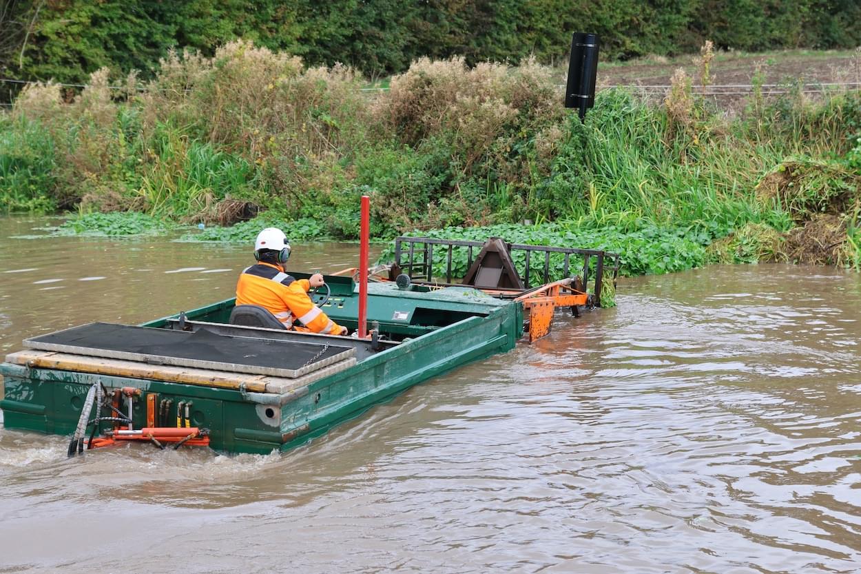 Canal & River Trust working on weed on Christleton Canal