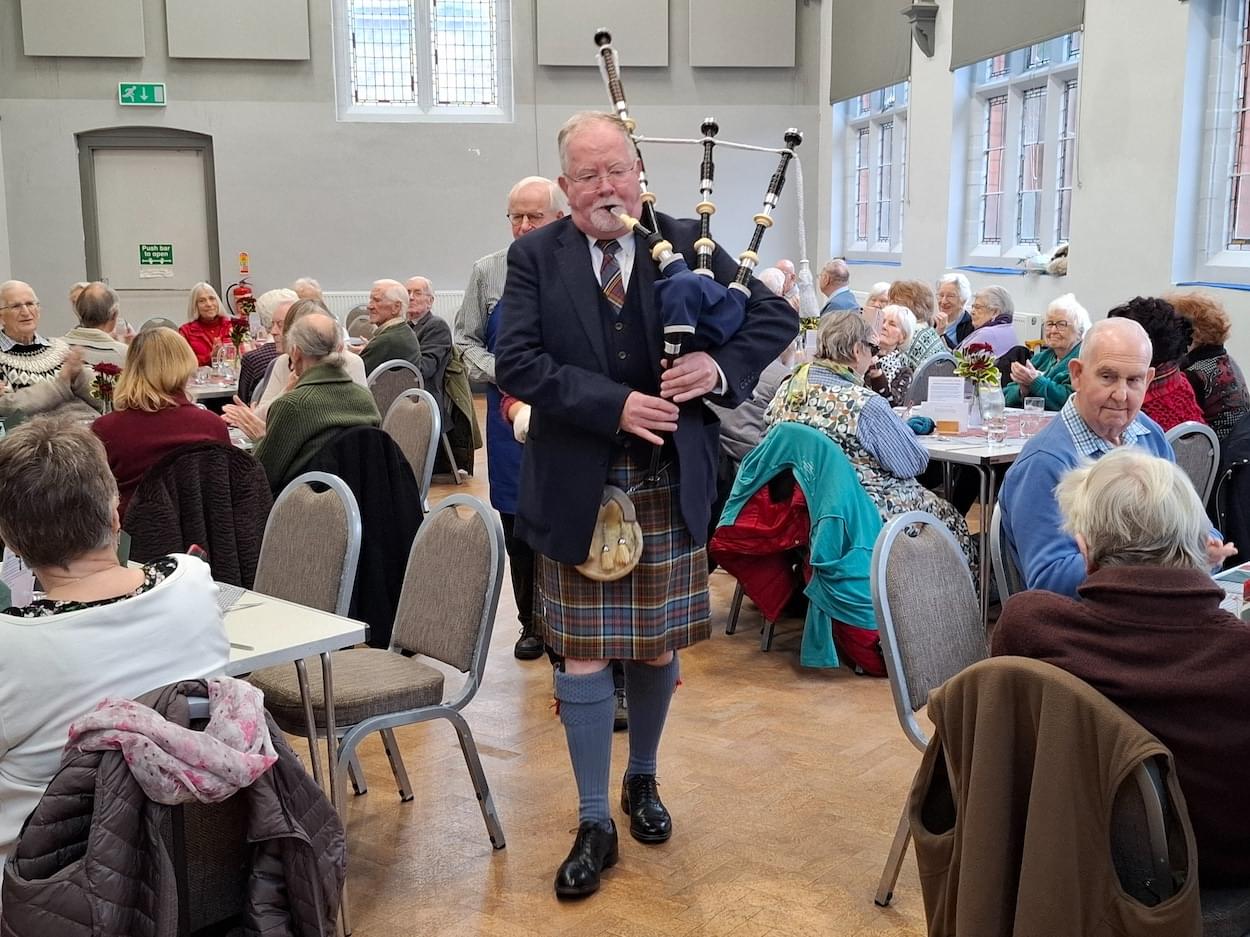 Piper Piping in the Haggis at the Luncheon Club